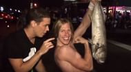 Orange Cassidy holding a Fish